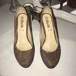 Red bottom sparkly heels